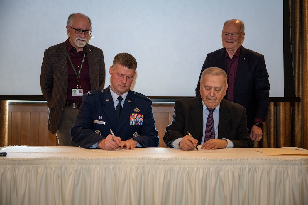 U.S. Air Force Col. Dustin Richards, 88th Air Base Wing and installation commander, and local leaders gather for the signing ceremony for the new Air Camp on Feb. 17, 2026, in Beavercreek, Ohio. The U.S. Air Force issued an Outgrant License for 16 acres of property that will serve as the future site of the STEM Talent Development Complex. (U.S. Air Force photo by Jack Gardner)