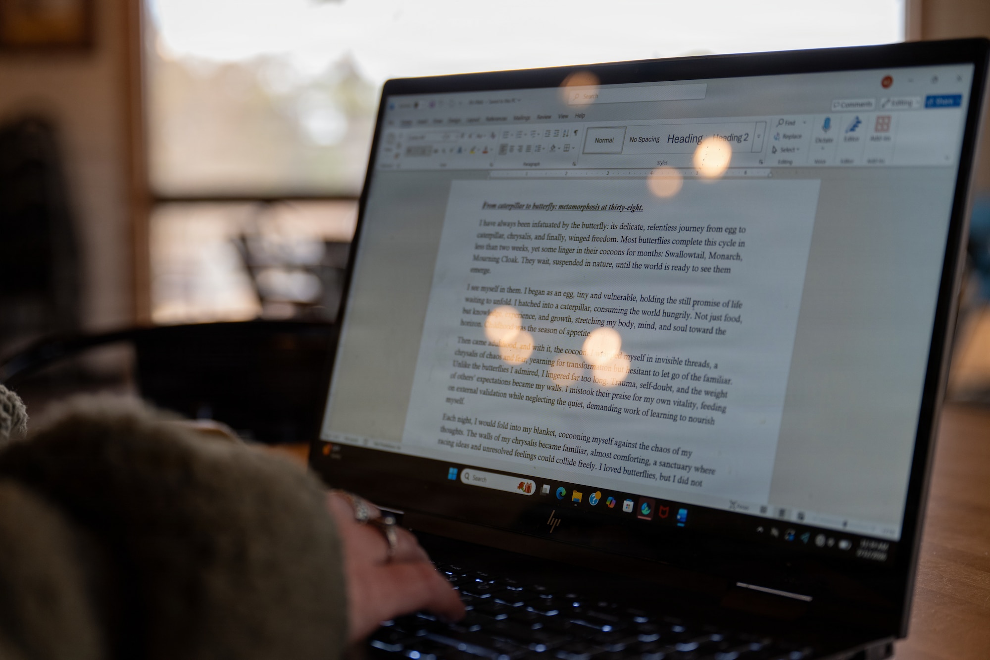 U.S. Air Force Staff Sgt. Alison Gandulla, 4th Contracting Squadron contract specialist, composes poetry on her laptop at Seymour Johnson Air Force Base, North Carolina, Feb. 12, 2026. Gandulla uses personal experiences to create poetry that cultivates resilience and mental fortitude. (U.S. Air Force photo by Airman 1st Class Rebecca Tierney)