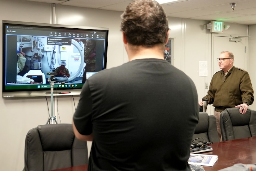 Maj. Gen. James D. Turinetti IV, commanding general of U.S. Army Communications-Electronics Command, observes a telemaintenance support mission while visiting U.S. Army Medical Logistics Command’s Medical Maintenance Operations Division in Tracy, California, in January 2026. The mission focused on the repair of a complex C-arm medical imaging device in Iraq.