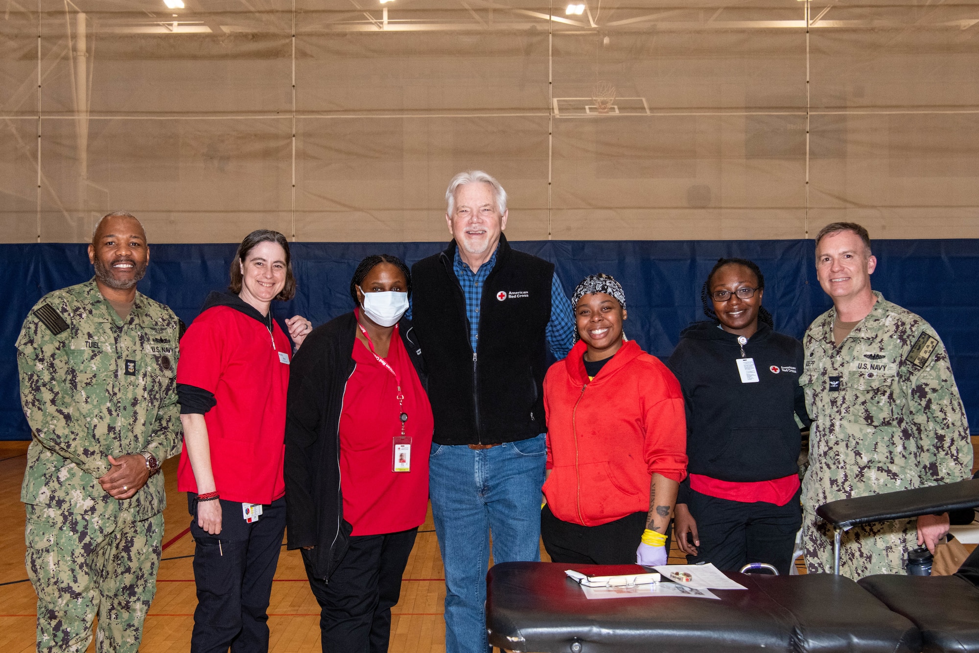A photo of American Red Cross team members and visitors standing together.