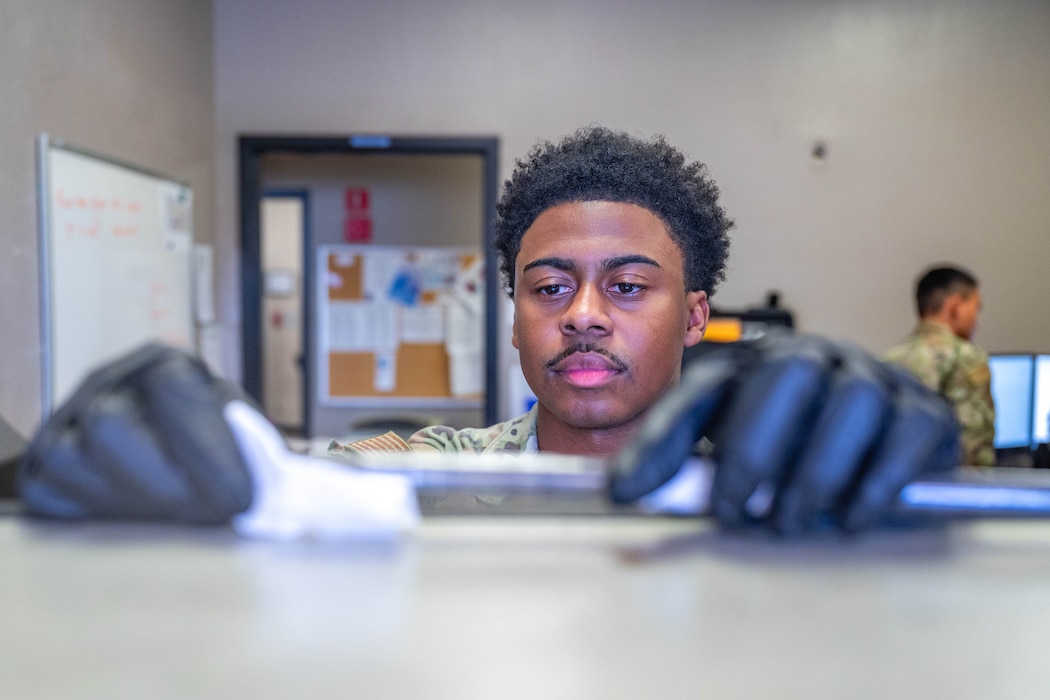 U.S. Air Force Senior Airman Ahmad May, 56th Equipment Maintenance Squadron non-destructive inspection journeyman, prepares a joint oil analysis, Feb. 17, 2026, at Luke Air Force Base, Arizona.