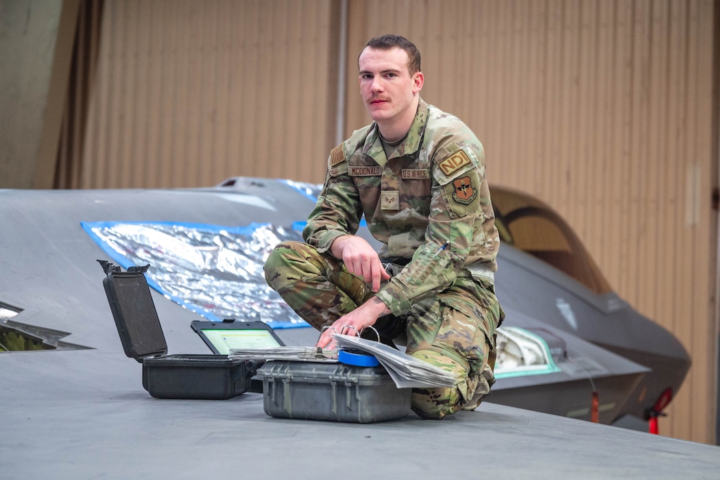 U.S. Air Force Senior Airman Riley McDonald, 56th Equipment Maintenance Squadron non-destructive inspection journeyman, poses for a photo on an F-35A Lightning II, Feb. 17, 2026, at Luke Air Force Base.