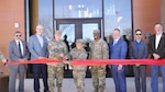 Brig. Gen. Brad Carter, Col. Lindy White and Capt. E.J. Johnson, Oklahoma Army National Guard, are joined by Oklahoma Representative Chris Kannady,  Flintco Construction, Larson Design Group, and Oklahoma Army National Guard Construction and Facilities Maintenance Office, during the ribbon cutting ceremony for the Oklahoma National Guard Wellness Center in Oklahoma City, Feb. 19, 2026. The 35,000-square-foot facility at the Oklahoma City Military Complex in Oklahoma City. Amenities within the wellness center include a fully equipped workout space for resistance training and agility, indoor and outdoor meditation spaces, a chapel, conference rooms, classroom spaces, and a teaching kitchen. The facility also houses OKNG programs and services, including Behavioral Health, Chaplain, Equal Employment Opportunity, Family Programs, Holistic Health and Fitness (H2F), Integrated Primary Prevention, Resilience, Suicide Prevention, Substance Abuse Prevention and Risk Reduction, and Sexual Assault Prevention and Response. (Oklahoma National Guard photo by Anthony Jones)