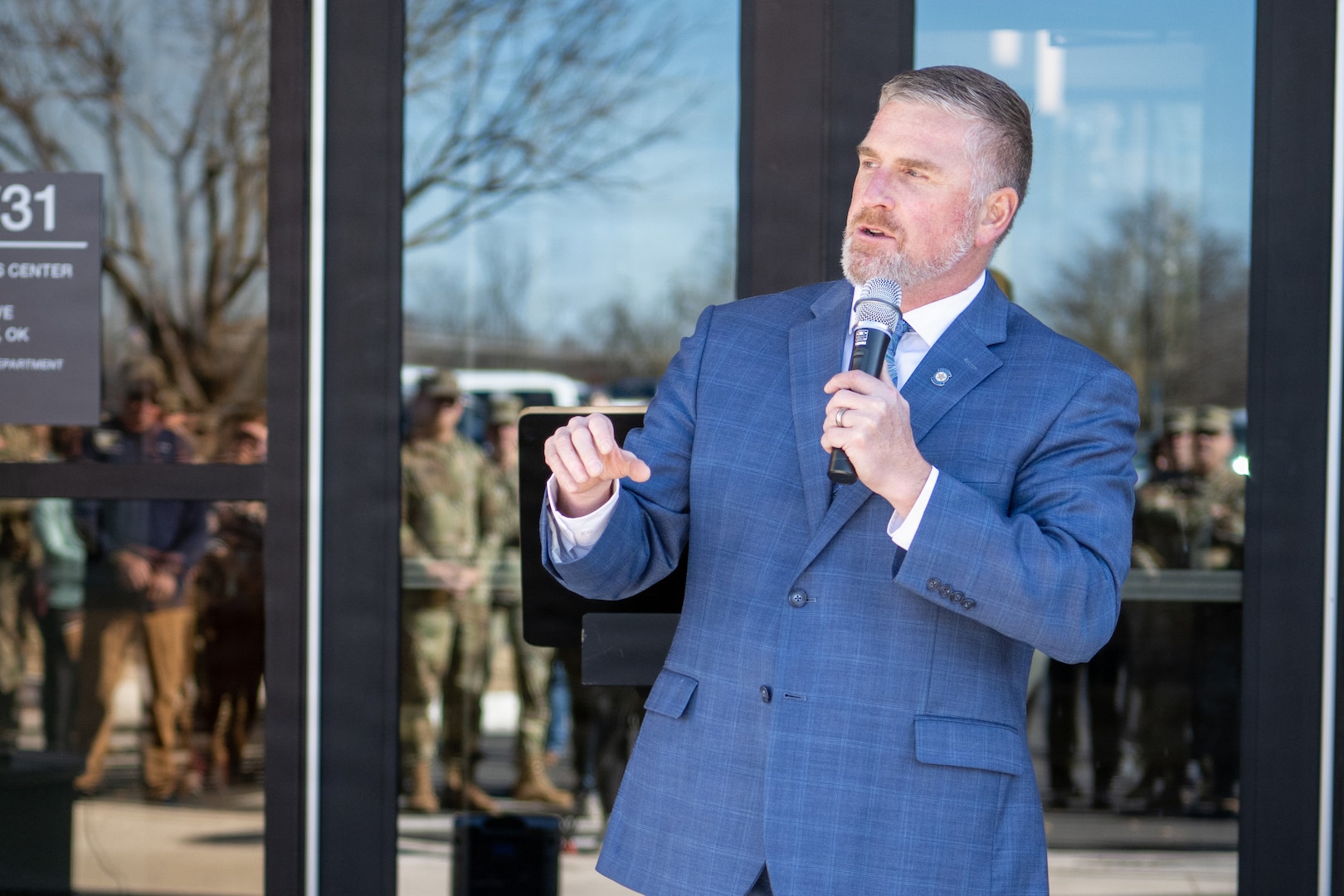 Representative Chris Kannady, speaks during the ribbon cutting ceremony for the Oklahoma National Guard Wellness Center in Oklahoma City, Feb. 19, 2026. Kannady, a member of the Oklahoma state legislature also serves Oklahoma as an officer in the Oklahoma Air National Guard. The nearly 35,000-square-foot facility at the Oklahoma City Military Complex in Oklahoma City. Amenities within the wellness center include a fully equipped workout space for resistance training and agility, indoor and outdoor meditation spaces, a chapel, conference rooms, classroom spaces, and a teaching kitchen. The facility also houses OKNG programs and services, including Behavioral Health, Chaplain, Equal Employment Opportunity, Family Programs, Holistic Health and Fitness (H2F), Integrated Primary Prevention, Resilience, Suicide Prevention, Substance Abuse Prevention and Risk Reduction, and Sexual Assault Prevention and Response. (Oklahoma National Guard photo by Anthony Jones)