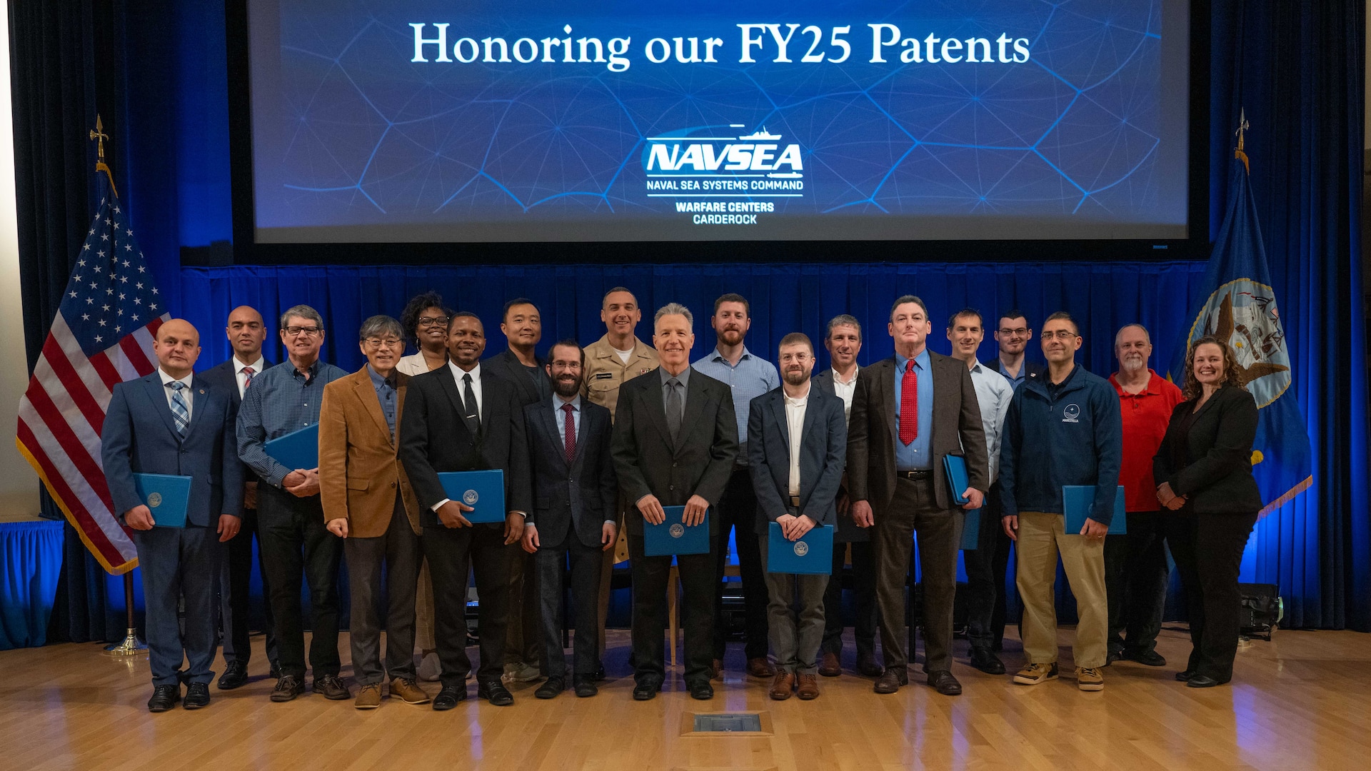 Inventors from Naval Surface Warfare Center Carderock Division gather for the FY25 Patent Awards Ceremony, where the command recognized employees whose innovations were issued U.S. patents over the past year. The event highlights Carderock’s ongoing commitment to cultivating and celebrating technical creativity across the workforce. (U.S. Navy photo by Corum Beyers.)