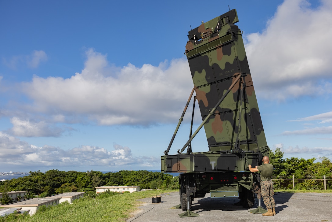 U.S. Marine Corps Lance Cpl. Tanner Angiletta sets up an AN/TPS-80 Ground/Air Task Oriented Radar during a joint fire support rehearsal training at Kadena Air Base, Okinawa, Japan, Aug. 7, 2025. During the training, the 12th Littoral Anti-Air Battalion’s Tactical Air Control Element (TACE) executed air surveillance operations to enhance coordination procedures and operational readiness. Angiletta, a native of Connecticut, is an aviation radar technician with 12th LAAB, 12th Marine Littoral Regiment, 3d Marine Division. (U.S. Marine Corps photo by Cpl. Evelyn Doherty)