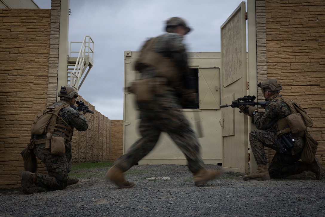 U.S. Marines with 1st Battalion, 25th Marine Regiment practice room clearing techniques during the Intermediate Location (ILOC) event held at Camp Pendleton, California, Feb. 10, 2026. ILOC is a pre-deployment event to ensure combat readiness, emphasizing small-unit leadership roles and responsibilities. (U.S. Marine Corps photo by Lance Cpl. Claire Cheney)