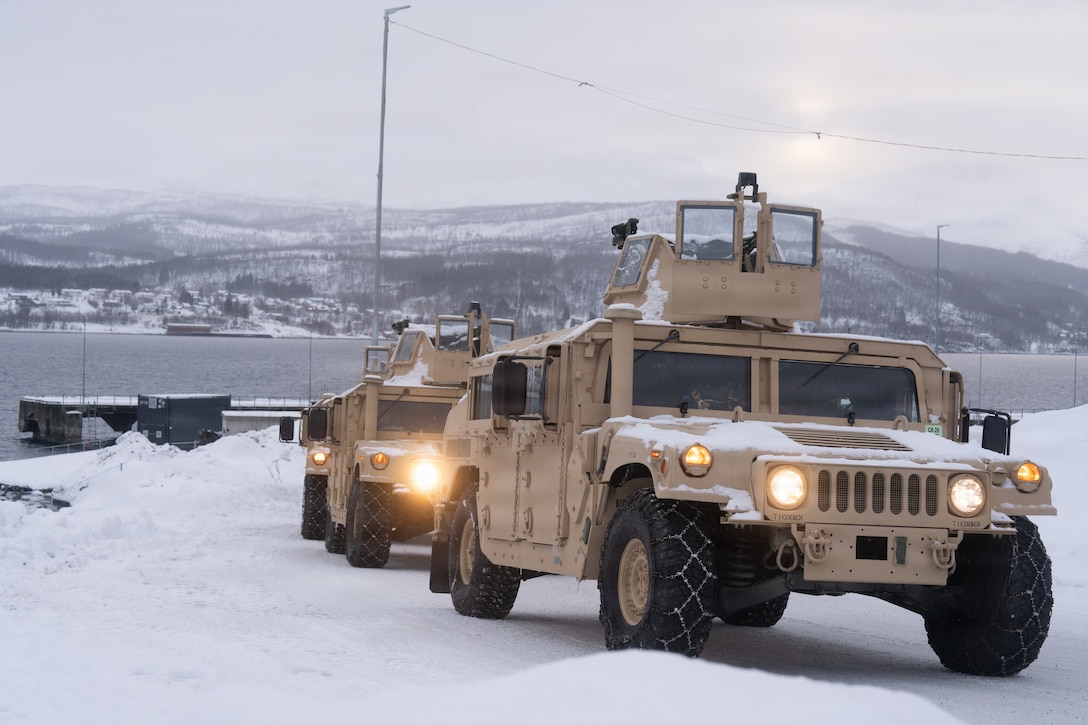 U.S. Marines with 2nd Distribution Support Battalion, Combat Logistics Regiment 27, 2nd Marine Logistics Group, conduct a tactical convoy in preparation for exercise Cold Response 26 in Sorresia, Norway, Feb. 11, 2026. Marines with CLR-27 arrival and assembly operations group transport ground equipment and logistical supplies for future dissemination of assets to support and sustain operations across various levels of a Marine Air-Ground Task Force. A key component of NATO's enhanced vigilance activity Arctic Sentry, exercise Cold Response 26 is a Norwegian-led winter military exercise designed to enhance collective defense capabilities and ensure U.S. readiness to rapidly deploy and seamlessly operate alongside NATO Allies in challenging arctic conditions. (U.S. Marine Corps photo by Lance Cpl. Javier Santillan)