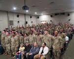 Soldiers assigned to the Louisiana National Guard’s 2228th Military Police Company recite the Soldier’s Creed at the conclusion of a departure ceremony at the post theater on Camp Beauregard in Pineville, Louisiana, Feb. 11, 2026.