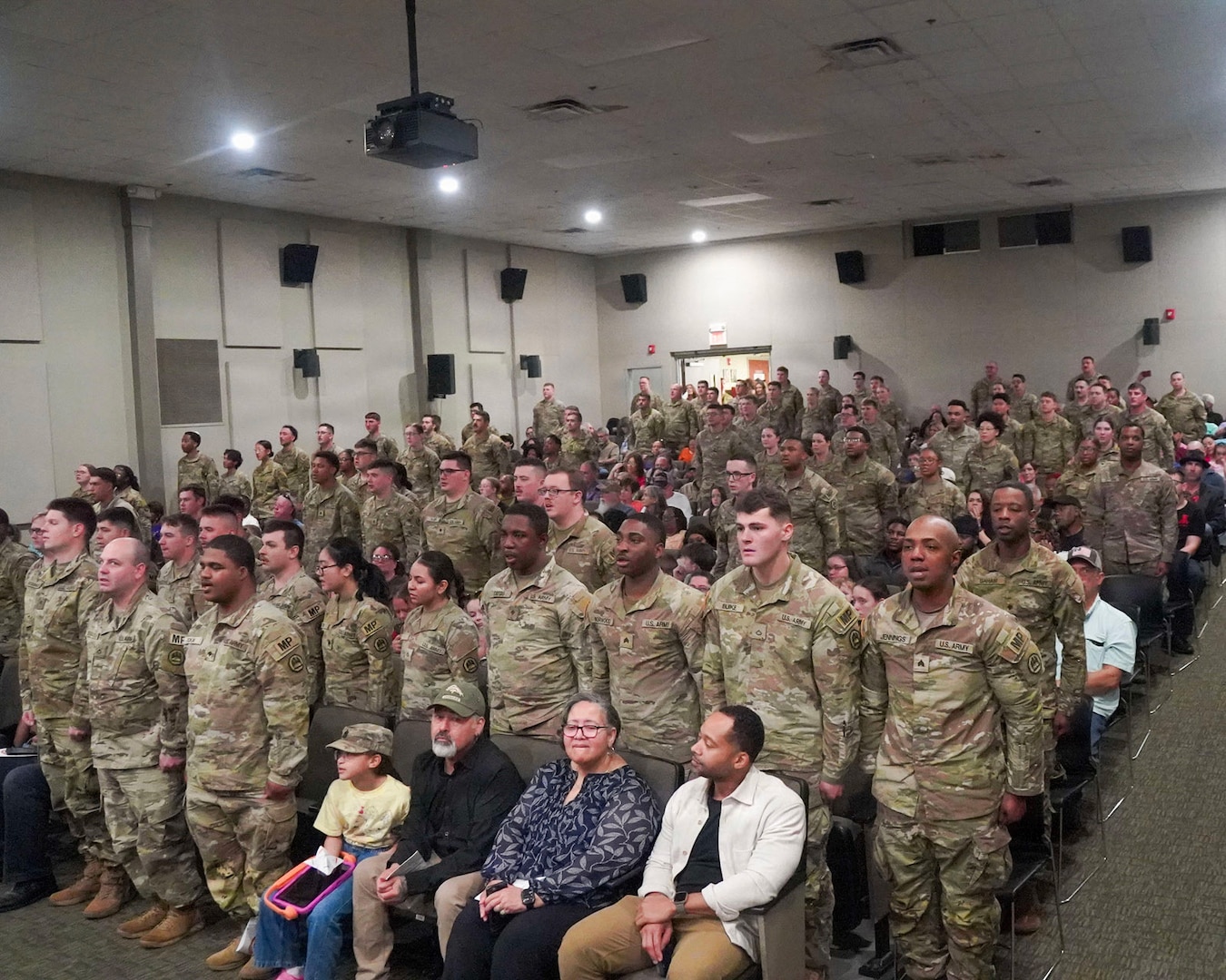 Soldiers assigned to the Louisiana National Guard’s 2228th Military Police Company recite the Soldier’s Creed at the conclusion of a departure ceremony at the post theater on Camp Beauregard in Pineville, Louisiana, Feb. 11, 2026.
