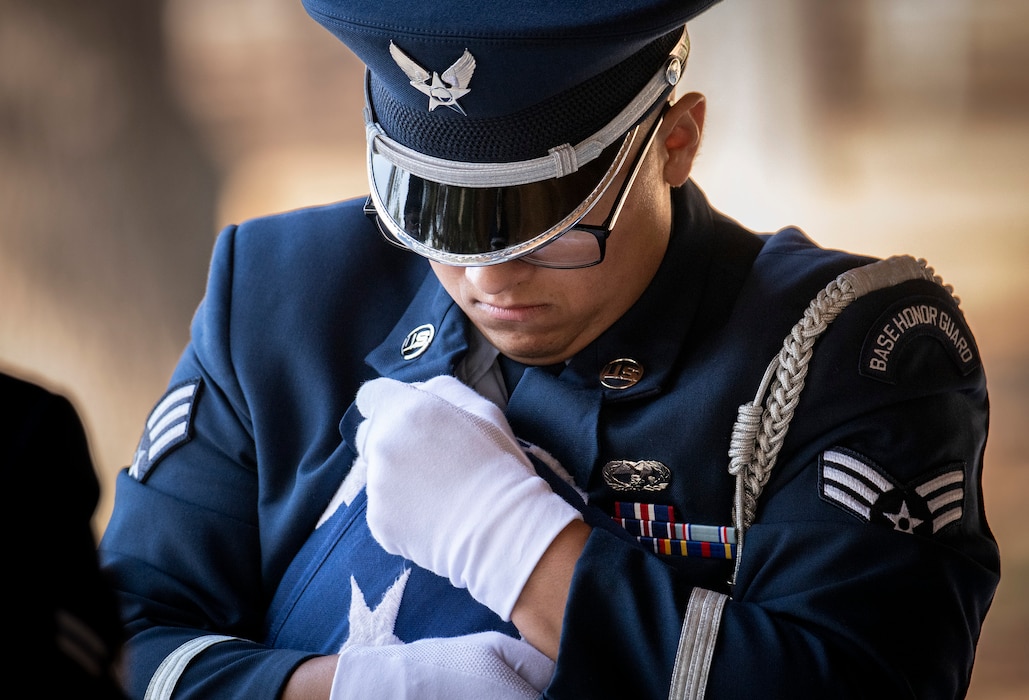 Airman holding flag