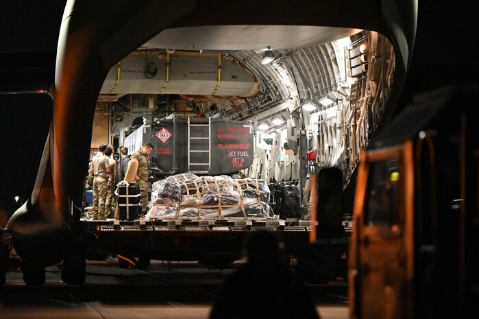 Joint Base Charleston personnel prepare to offload a pallet from a C-17 Globemaster III aircraft upon returning from Operation Palmetto Reach, a part of Combat Readiness Exercise 2026, at Joint Base Charleston.