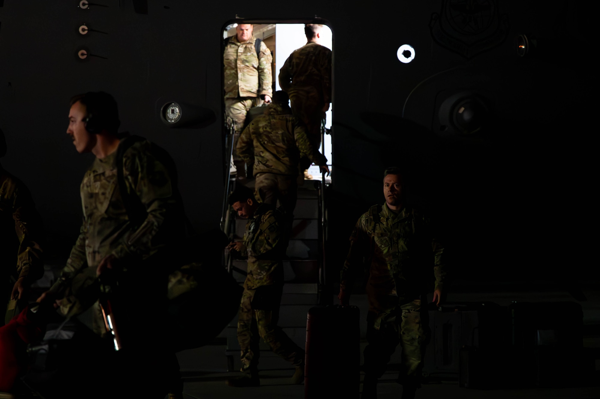 Joint Base Charleston Airmen deplane from a C-17 Globemaster III aircraft upon returning from Operation Palmetto Reach, a part of Combat Readiness Exercise 2026, at Joint Base Charleston.