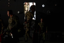 Joint Base Charleston Airmen deplane from a C-17 Globemaster III aircraft upon returning from Operation Palmetto Reach, a part of Combat Readiness Exercise 2026, at Joint Base Charleston.