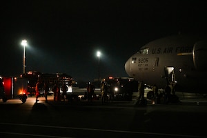 Joint Base Charleston Airmen deplane from a C-17 Globemaster III aircraft upon returning from Operation Palmetto Reach, a part of Combat Readiness Exercise 2026, at Joint Base Charleston.
