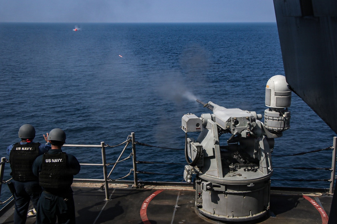 A Mark 38 25mm machine gun fires at a training target during a live-fire exercise aboard Arleigh Burke-class guided-missile destroyer USS Frank E. Petersen Jr. (DDG 121), Feb. 10, 2026. Frank E. Peterson Jr. is deployed to the U.S. 5th Fleet area of operations to support maritime security and stability throughout the Middle East. (U.S. Navy photo by Mass Communication Specialist 2nd Class Christian Kibler)