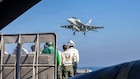 An F/A-18F Super Hornet, attached to Strike Fighter Squadron (VFA) 41, prepares to make an arrested landing on the flight deck of Nimitz-class aircraft carrier USS Abraham Lincoln (CVN 72) in the Arabian Sea, Feb. 15, 2026. Abraham Lincoln is deployed to the U.S. 5th Fleet area of operations to support maritime security and stability in the Middle East. (U.S. Navy photo by Mass Communication Specialist Seaman Daniel Kimmelman)