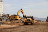 The U.S. Army Corps of Engineers contractors dig trenches and install border panels at the west end of the BMGR-1 project site Jan. 28 near Yuma, Arizona. USACE is replacing permanent border barriers along the southern border of the U.S. at the direction of the U.S. Army by the Secretary of War, in response to the presidential national emergency declaration dated Jan. 20, 2025, authorizing the use of Section 2803 of Title 10, U.S. Code. (No one in this image crossed the international border) (Photo by Robert DeDeaux USACE PAO).