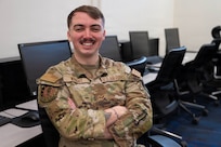 U.S. Air Force Senior Airman Matthew Wright, a cyber analyst with the 267th Intelligence Squadron, poses for a photo on Otis Air National Guard Base, Massachusetts, Feb. 18, 2026.