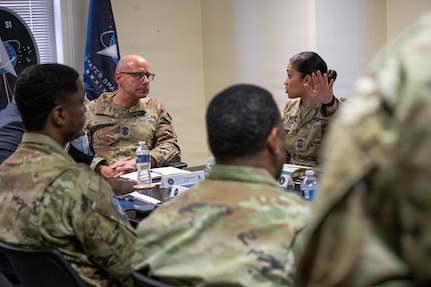 Chief Master Sergeant of the Space Force John Bentivegna listens to Chief Master Sgt. Vicky Olivera, senior enlisted leader for U.S. Space Force Enterprise Talent Management, discuss Guardian promotions and talent management, traditionally known as recruitment and retention, in the military’s newest service branch. ETMO manages the full career lifecycle of military and civilian Guardians, from accession to retirement, by fostering a flexible, non-linear career path that focuses on specialized skills in space, cyber and intelligence to deliver the world's premier space power. (U.S. Air Force photo by Kevin Prashad)