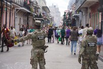 Louisiana National Guard Soldiers conduct crowd management operations in the French Quarter during peak Mardi Gras security operations in New Orleans, Feb. 17, 2026.