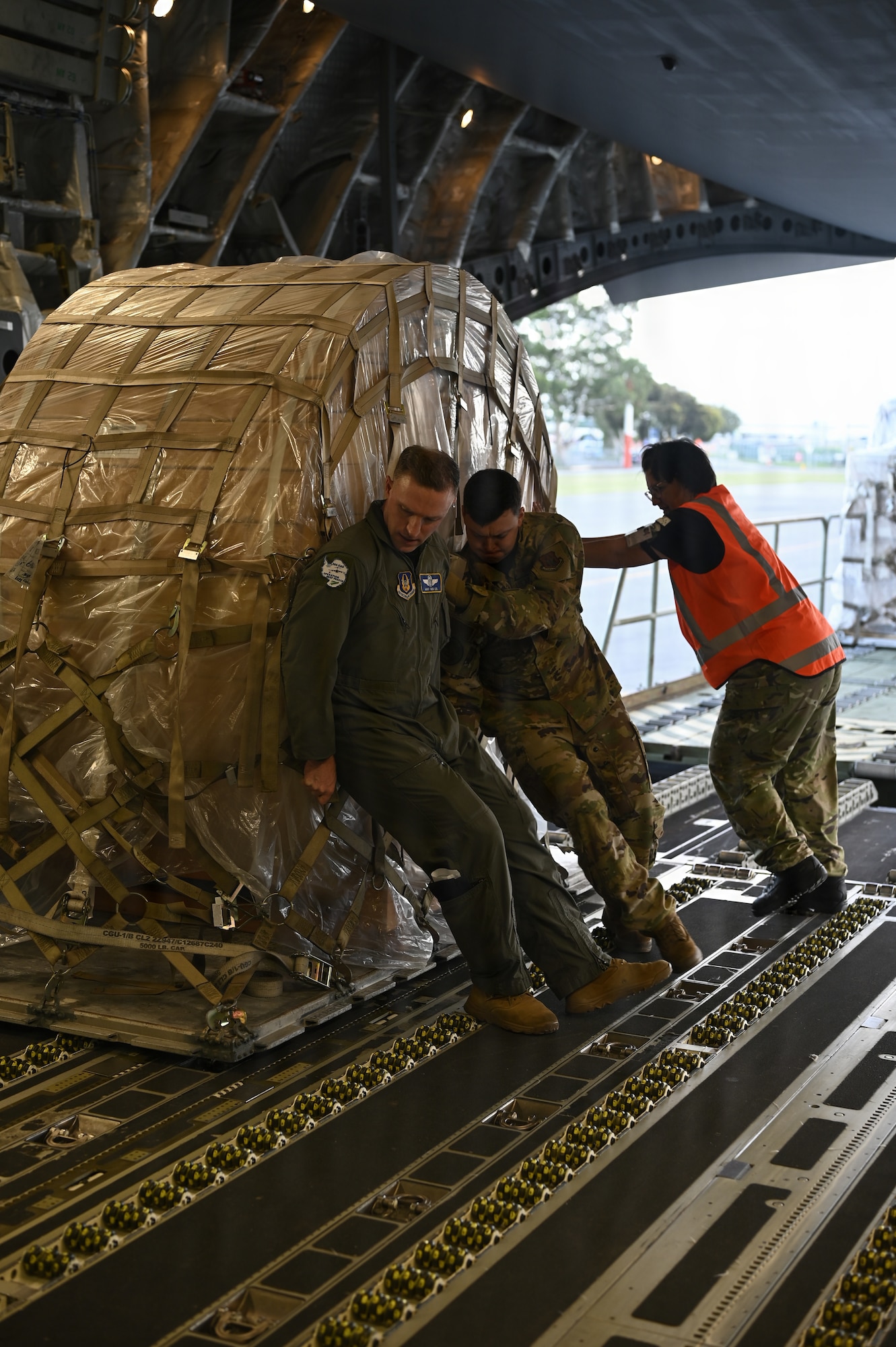 U.S. Airmen and Christchurch Airport personnel load a C-17 Globemaster III in preparation for a flight to McMurdo Station at Christchurch, New Zealand, Feb 8, 2026. Due to seasonal ice conditions in Antarctica, Operation Deep Freeze’s aircraft operations require months of precise planning to ensure the runway and safely support a C-17. (U.S. Air Force photo by Staff Sgt. Ethan Sherwood)