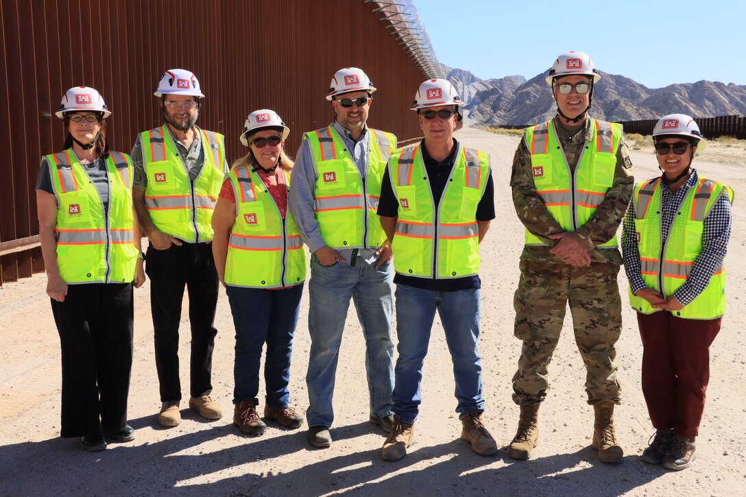 Leaders and staff from the U.S. Army Corps of Engineers oversee BMGR-1 project construction and bollard installation Feb. 9 near Yuma, Arizona. The BMGR-1 border barrier project spans approximately 15 miles, replacing older fencing with steel bollard barriers. USACE is replacing permanent border barriers along the southern border of the U.S. at the direction of the U.S. Army by the Secretary of War, in response to the presidential national emergency declaration dated Jan. 20, 2025, authorizing the use of Section 2803 of Title 10, U.S. Code. (Photo by Robert DeDeaux USACE PAO)
