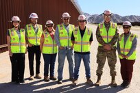 Leaders and staff from the U.S. Army Corps of Engineers oversee BMGR-1 project construction and bollard installation Feb. 9 near Yuma, Arizona. The BMGR-1 border barrier project spans approximately 15 miles, replacing older fencing with steel bollard barriers. USACE is replacing permanent border barriers along the southern border of the U.S. at the direction of the U.S. Army by the Secretary of War, in response to the presidential national emergency declaration dated Jan. 20, 2025, authorizing the use of Section 2803 of Title 10, U.S. Code. (Photo by Robert DeDeaux USACE PAO)