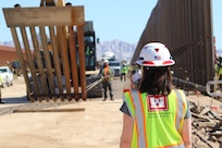 Leaders and staff from the U.S. Army Corps of Engineers oversee BMGR-1 project construction and bollard installation Feb. 9 near Yuma, Arizona. The BMGR-1 border barrier project spans approximately 15 miles, replacing older fencing with steel bollard barriers. USACE is replacing permanent border barriers along the southern border of the U.S. at the direction of the U.S. Army by the Secretary of War, in response to the presidential national emergency declaration dated Jan. 20, 2025, authorizing the use of Section 2803 of Title 10, U.S. Code. (Photo by Robert DeDeaux USACE PAO)