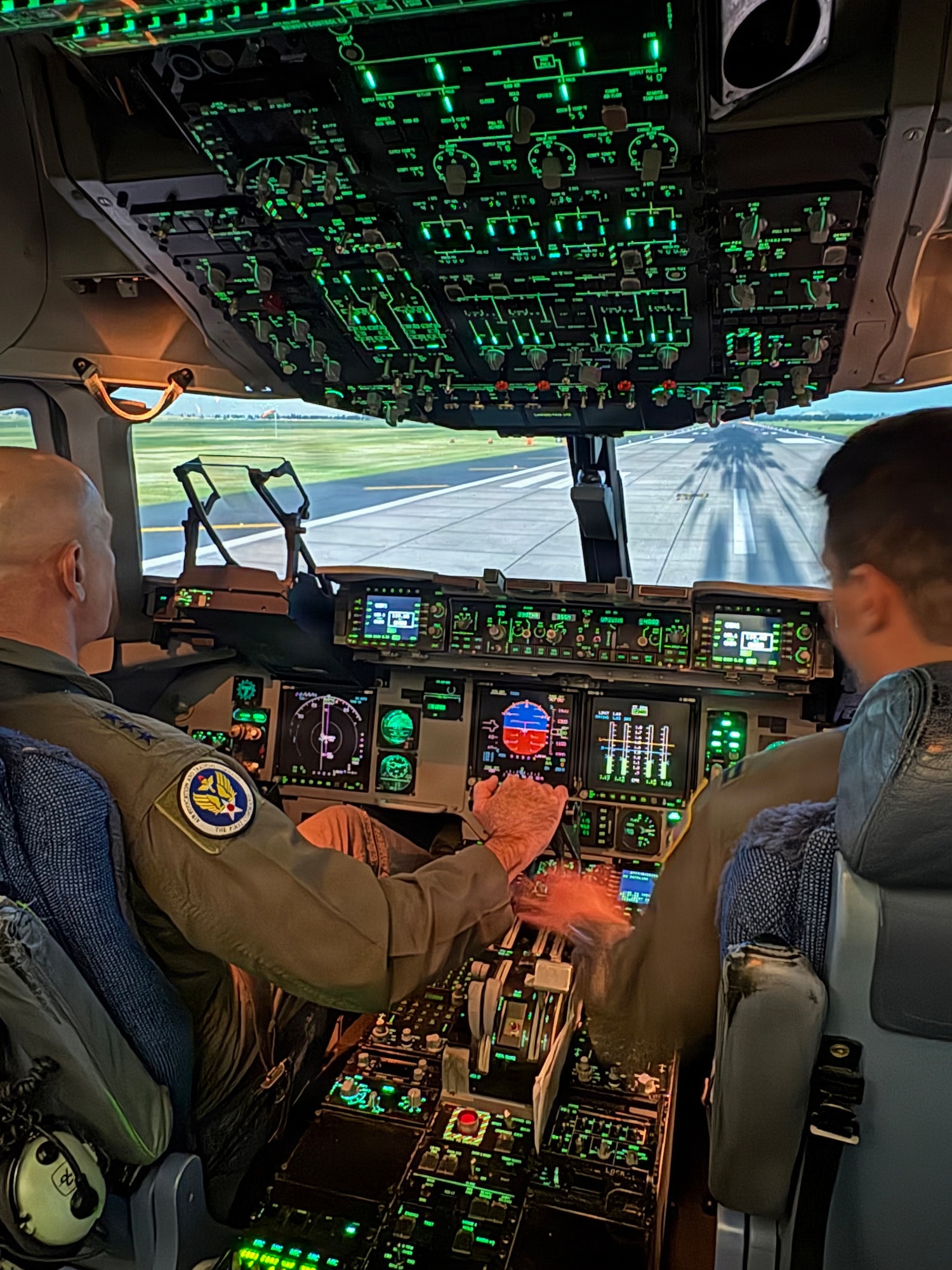 U.S. Air Force Lt. Gen. Clark Quinn, commander of Air Education and Training Command, operates a C-17 Globemaster III aircraft simulator at Altus Air Force Base, Oklahoma, Feb. 18, 2026. This hands-on experience provided him with a valuable perspective on the advanced training tools Airmen use to maintain readiness.  (Courtesy photo by Capt. Colin Laskodi)