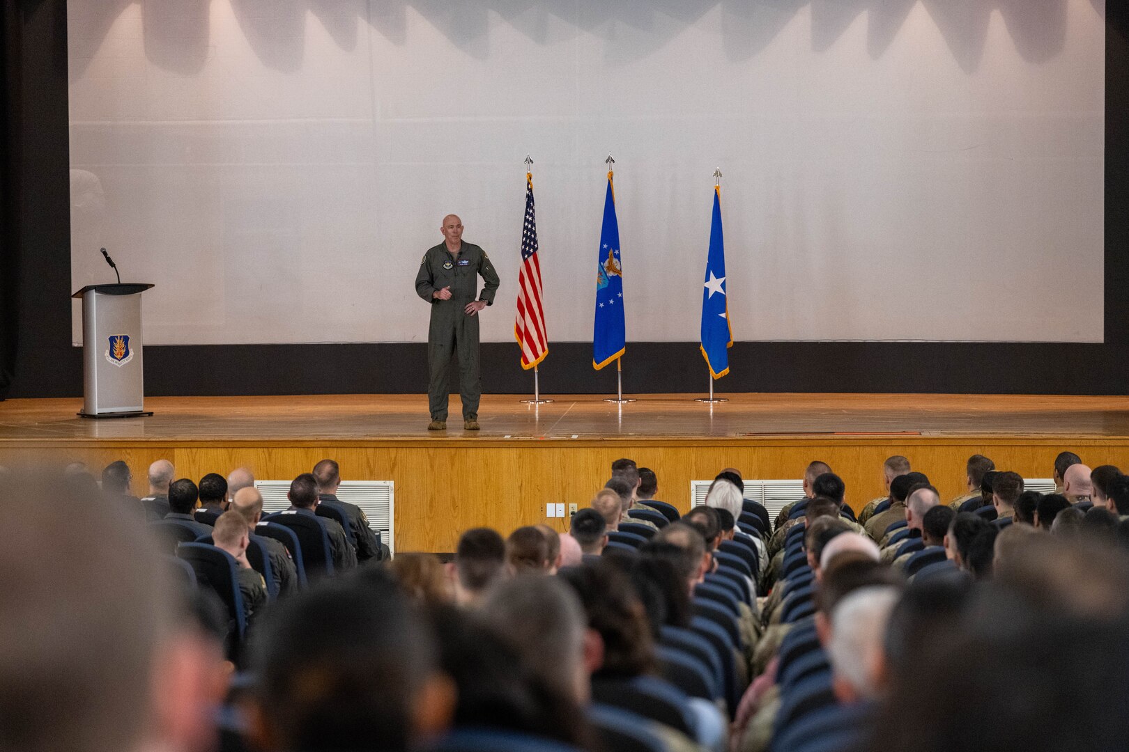U.S. Air Force Lt. Gen. Clark Quinn, commander of Air Education and Training Command (AETC), speaks to Airmen of the 97th Air Mobility Wing during an all-call at Altus Air Force Base, Oklahoma, Feb. 19, 2026. The all-call helped Airmen of the 97th Air Mobility Wing understand AETC’s priorities and how they fit into the strategic mission of the command. (U.S. Air Force photo by Airman 1st Class Emma Wright)