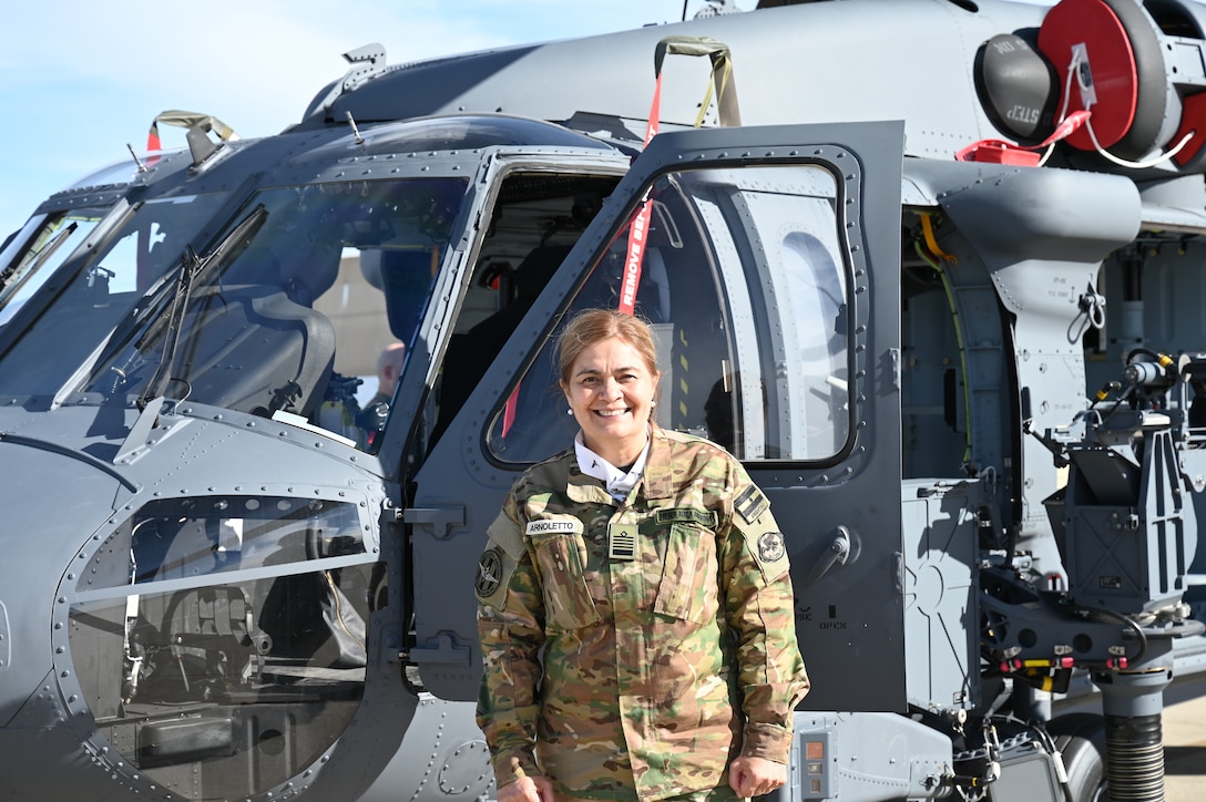 Argentine air force Col. Norma Arnoletto, chief medical director, poses for a photo in front of an HH-60W Jolly Green II helicopter, at Davis-Monthan Air Force Base, Arizona, Jan 6, 2026. During Arnoletto’s visit, she observed several U.S. Air Force medical programs designed to support human performance on the F-16 Fighting Falcon airframe, highlighting how operational medicine directly contributes to mission effectiveness, safety and longevity of F-16 operations. (U.S. Air Force photo by Staff Sgt. Abbey Rieves)