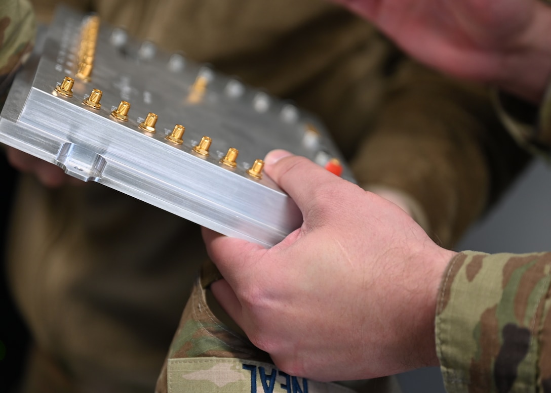 U.S. Space Force Master Sgt. Justin Neal, Space Forces Southern planner, inspects radar technology during a commercial radar site visit in Pearce, Arizona, Feb. 17, 2026. Guardians learned how the technology supports broader space domain awareness efforts. (U.S. Air Force photo by Staff Sgt. Abbey Rieves)