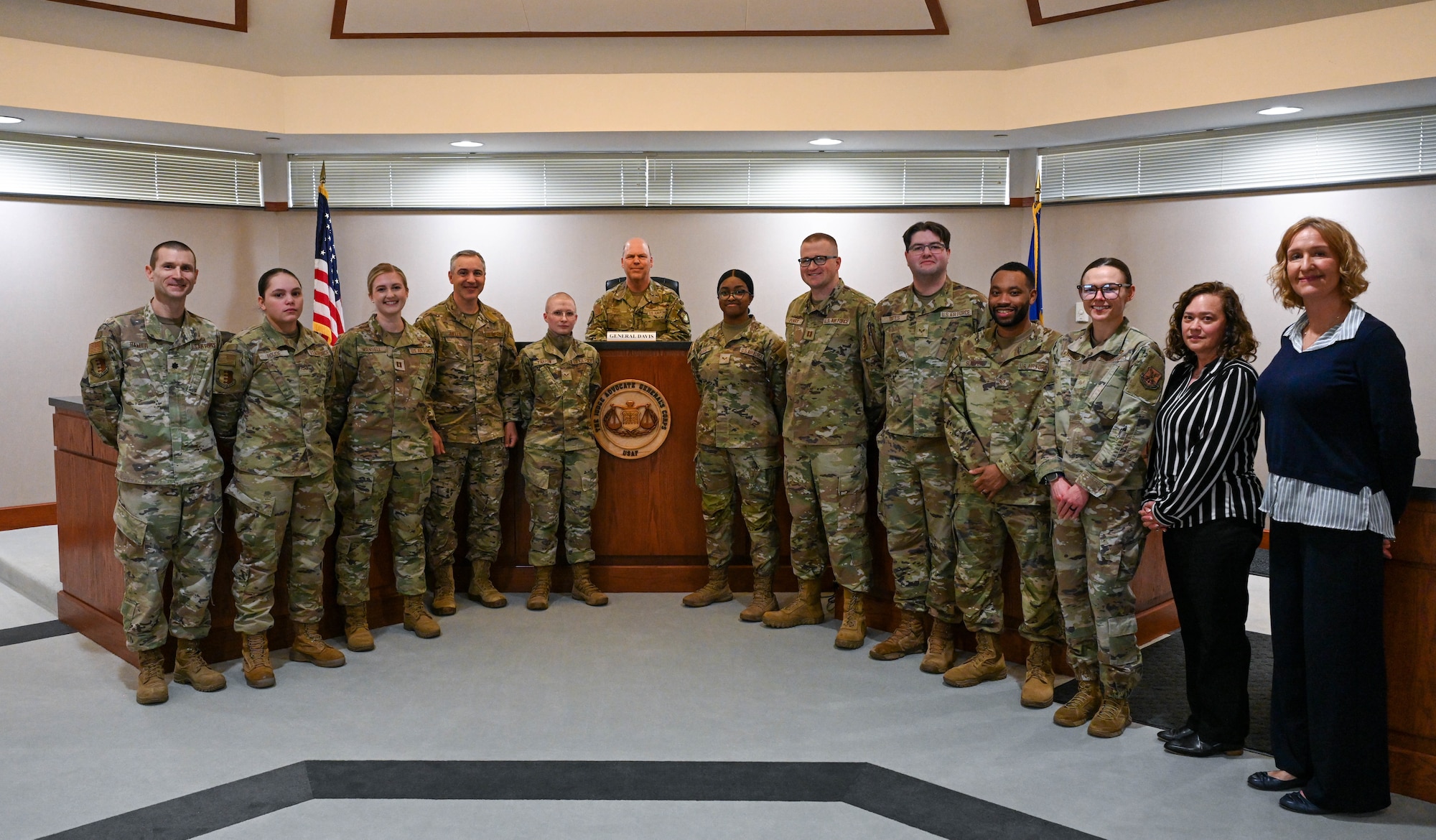 U.S. Air Force Gen. S.L. Davis, commander of Air Force Global Strike Command, poses for a group photo with 28th Bomb Wing Judge Advocate General office during a multi-mission visit at Ellsworth Air Force Base, S.D., Feb. 18, 2026.