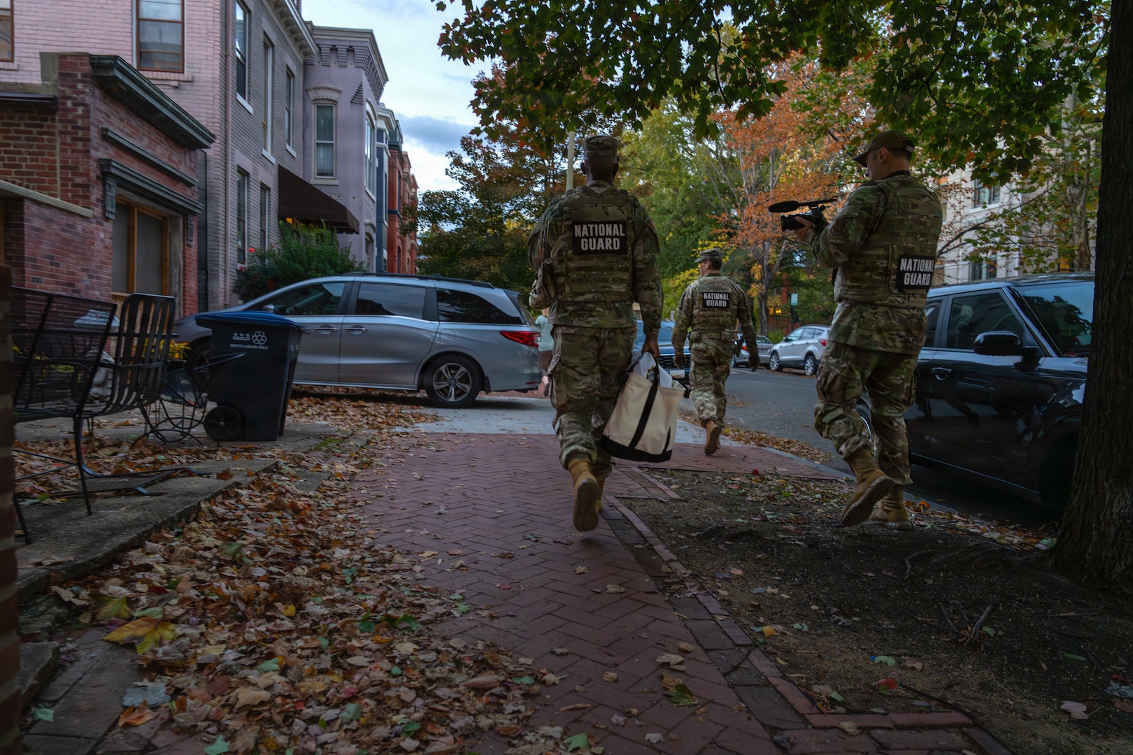 U.S. Air National Guard Master Sgt. William Blankenship records video alongside Joint Task Force–District of Columbia leadership during a circulation in Washington, Oct. 30, 2025. The Joint Task Force supports civil authorities in the nation’s capital through coordinated security operations, interagency collaboration and disciplined presence. Clear, accurate communication remains central to the mission, reinforcing transparency and public confidence while safeguarding lawful governance. (U.S. Army photo by Sgt. Angelina Tran)