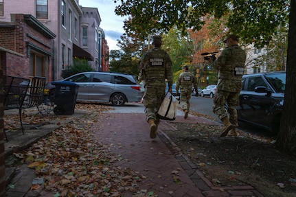 U.S. Air National Guard Master Sgt. William Blankenship records video alongside Joint Task Force–District of Columbia leadership during a circulation in Washington, Oct. 30, 2025. The Joint Task Force supports civil authorities in the nation’s capital through coordinated security operations, interagency collaboration and disciplined presence. Clear, accurate communication remains central to the mission, reinforcing transparency and public confidence while safeguarding lawful governance. (U.S. Army photo by Sgt. Angelina Tran)