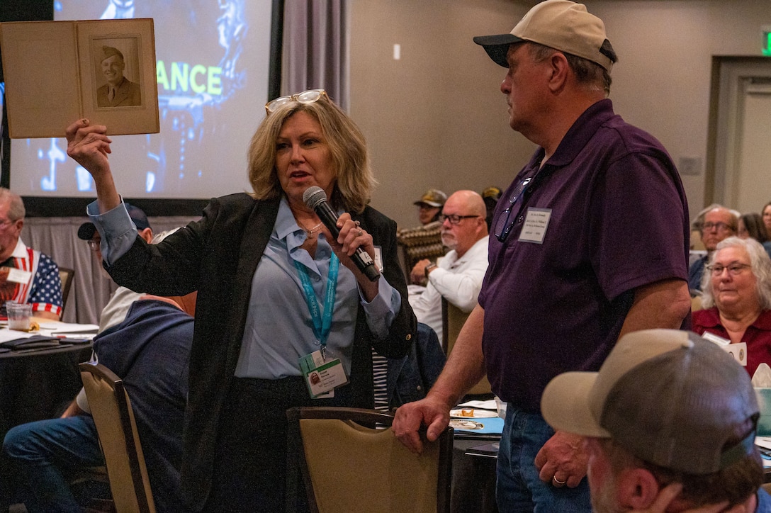 Susan Kennedy, a Charleston Family Member Update attendee shares a photo of her uncle, a U.S. Air Force pilot, on Feb. 21, 2026.