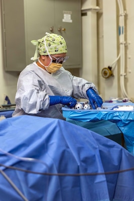 Hospital Corpsman 2nd Class Katherine Cordonrosario, from Kissimmee, Florida, temporarily assigned to Pre-Commissioning Unit John F. Kennedy (CVN 79) from USS Harry S. Truman (CVN 75), prepares medical equipment for the ship’s first at-sea surgery which occurred during Builder’s Trials, Feb. 1, 2026. Builder’s Trials provide an opportunity to test ship systems and components at sea for the first time, and make required adjustments prior to additional underway testing. (U.S. Navy photo by Mass Communication Specialist 1st Class Tyrell K. Morris)