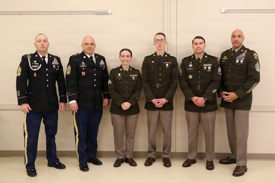Soldiers assigned to the 55th Maneuver Enhancement Brigade, Pennsylvania Army National Guard, appear before a brigade-level Best Warrior Competition board in their Army Service Uniforms, Feb. 21, 2026. Competitors were evaluated on military bearing, professional knowledge and overall appearance for the opportunity to represent the brigade at the Pennsylvania Army National Guard’s state-level Best Warrior Competition at Fort Indiantown Gap. (U.S. Army National Guard photo by Sgt. 1st Class Shane Smith)