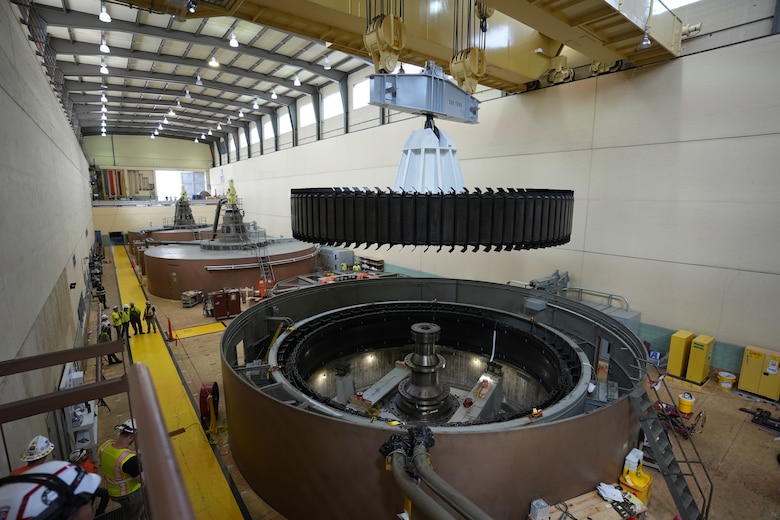 The U.S. Army Corps of Engineers Nashville District’s ongoing Hydropower Modernization Program authorized under Section 212 of the Water Resources Development Act of 2000 is making it possible to bring the generators up to date and to operate them more efficiently. In this photo, USACE employees and Andritz contractors carefully disassemble a massive rotor Sept. 3, 2025, from a hydropower unit at Old Hickory Dam Powerhouse on the Cumberland River in Hendersonville, Tennessee. (USACE Photo by Noe Gonzalez)