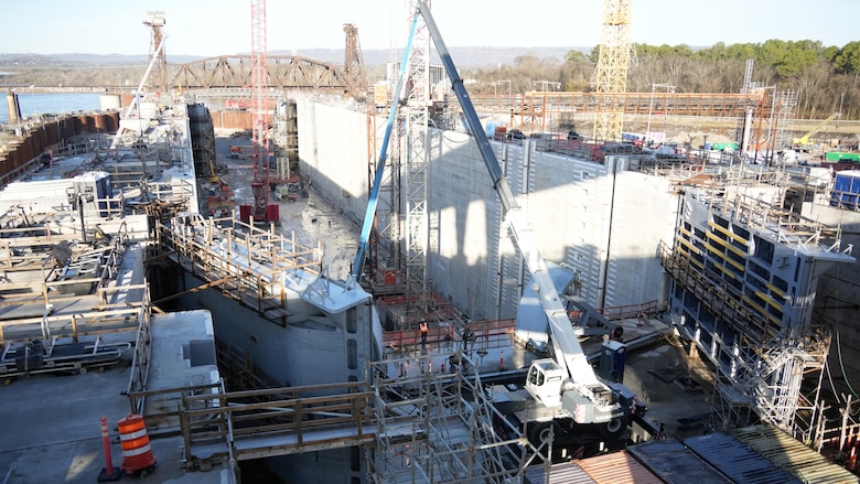 The U.S. Army Corps of Engineers Nashville District Chickamauga Lock Replacement Project at Tennessee River mile 471 in Chattanooga, Tennessee, is an example of a mega project that would examine financial and operational practices through this initiative to build more efficient processes that focus on building infrastructure, not paperwork. In this photo, sections of the miter gates in the lock chamber are in view that are being welded at the vital navigation infrastructure construction project Feb. 20, 2026. (USACE Photo by Noe Gonzalez)