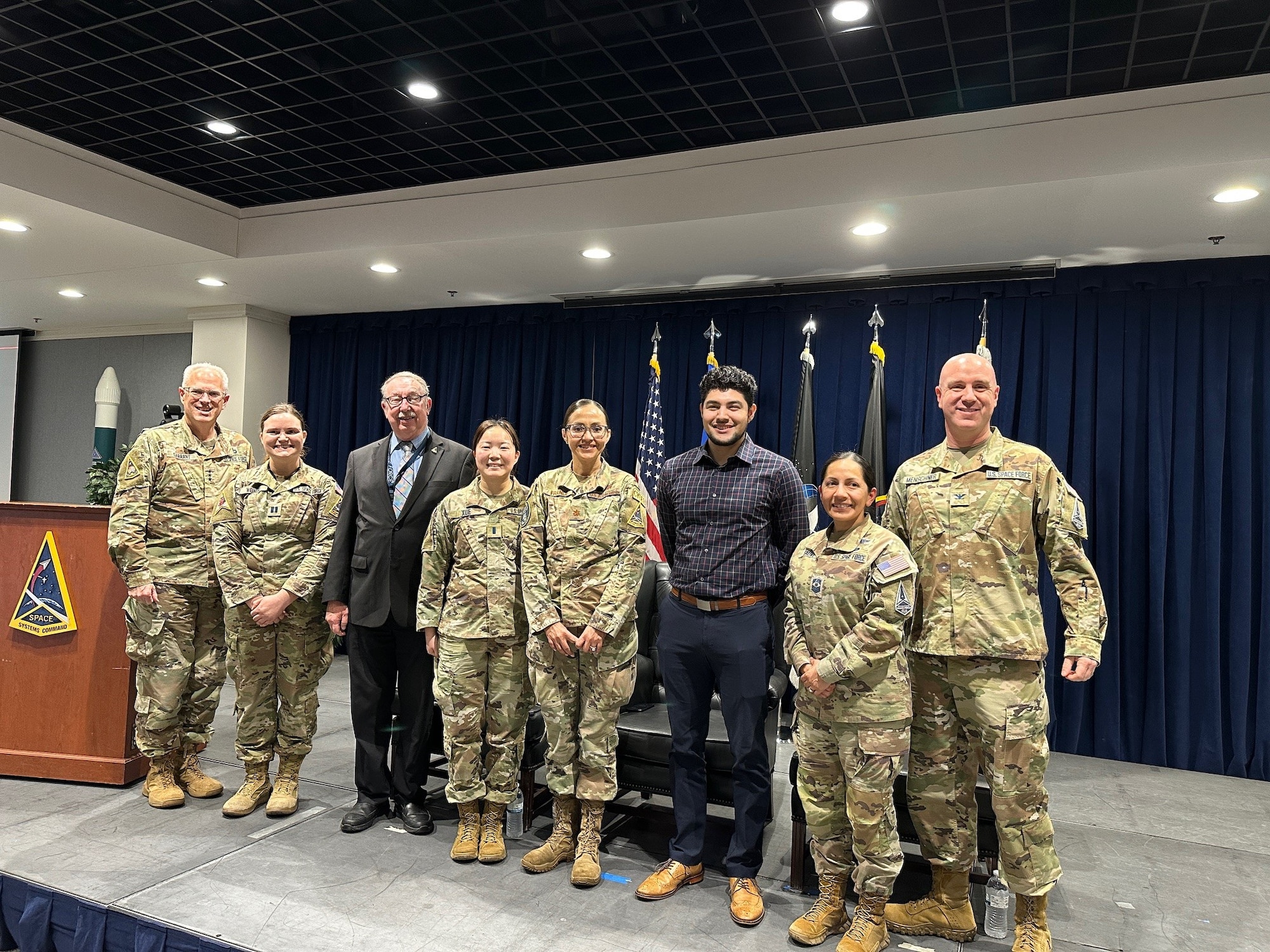 USSF Lt. Gen. Philip Garrant, Space Systems Command (SSC) commander (left) along with members of his senior leadership team congratulate winners of SSC’s annual Fight Tonight workforce innovation competition on February 12, 2026 at Los Angeles Air Force Base in Calif.