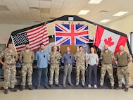 In September 2025, scientists from the Walter Reed Army Institute of Research—West participated in a collaborative effort with Baylor University and U.S. Army Combat Capabilities Development Command to collect data measuring physiological and psychological factors affecting combat medic performance during simulated patient encounters at Bold Quest 2025. Pictured are the WRAIR-West and Baylor team with U.K. medics who performed simulated point of injury care. This photo has been edited.