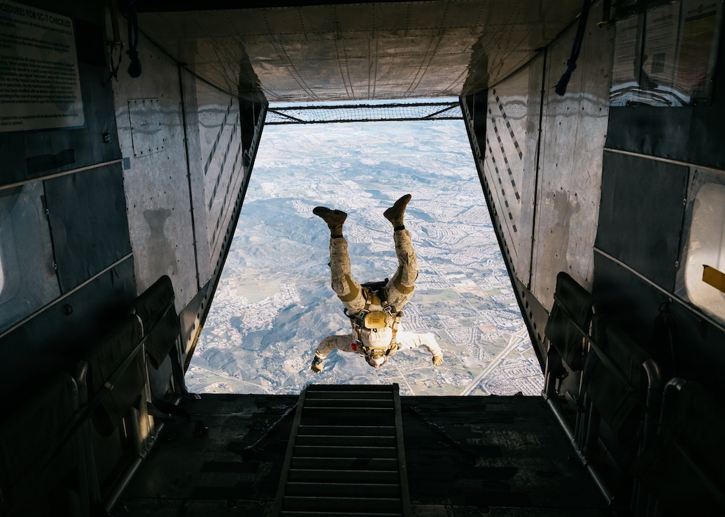 A U.S. Marine with the Maritime Raid Force, 11th Marine Expeditionary Unit, jumps from a Skyvan 3A during military free fall training in Lake Elsinore, California, Feb. 12, 2026. The training was conducted to rehearse aerial insertion tactics over difficult terrain to support expeditionary operations. (U.S. Marine Corps photo by Sgt. Joseph Helms)
