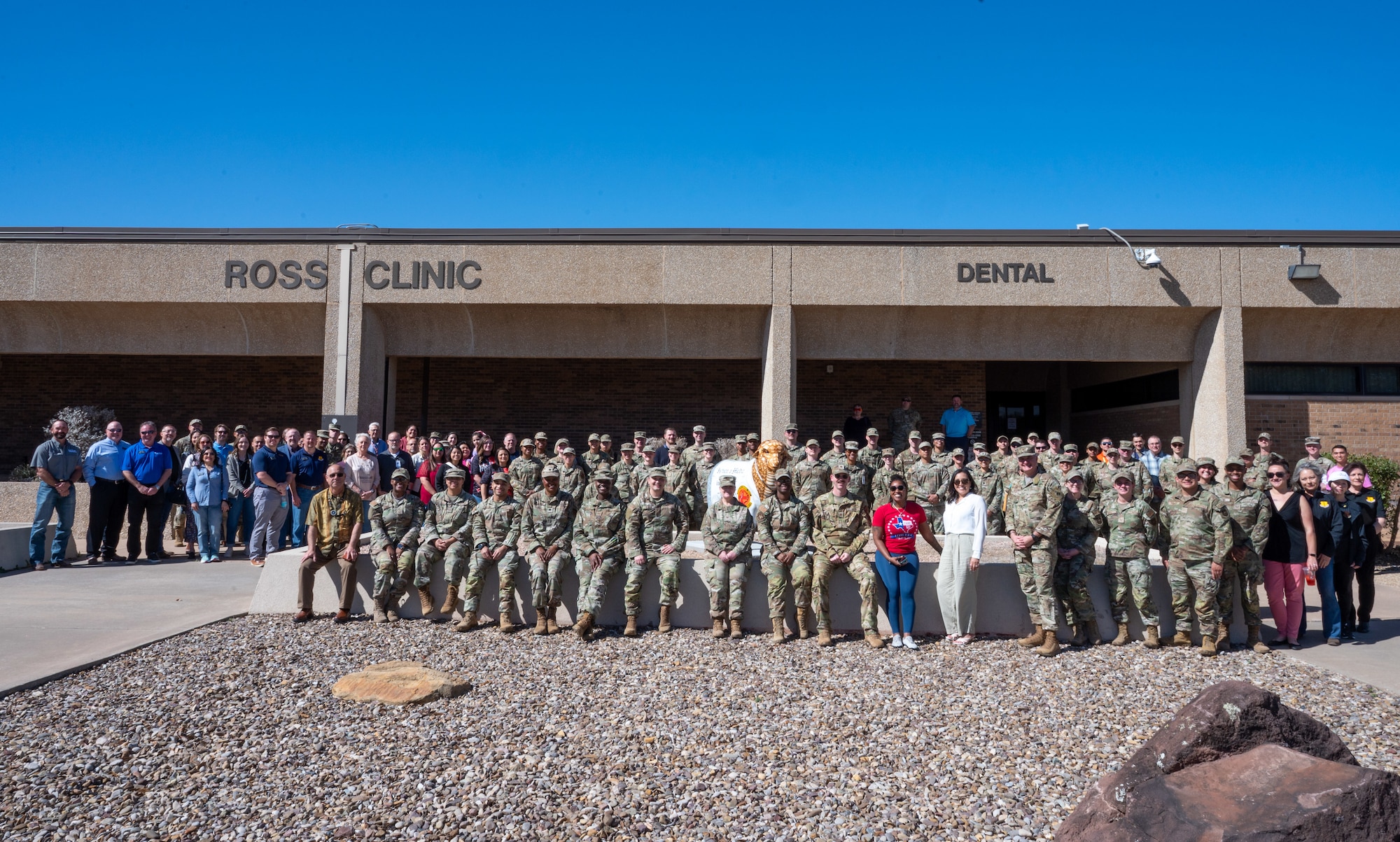A group photo in front of the Ross Medical Center on Goodfellow Air Force Base.