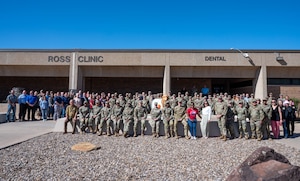 A group photo in front of the Ross Medical Center on Goodfellow Air Force Base.
