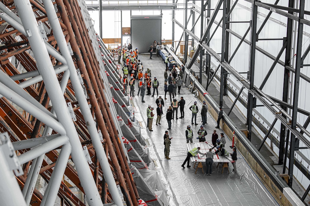 U.S. AIR FORCE ACADEMY, Colo. – The Cadet Chapel seen under an external 150-foot tall white environmental shelter as repair and restoration work continues on March 30, 2023 at the U.S. Air Force Academy in Colorado Springs, Colo. Contractors lowered the final panel of the U.S. Air Force Academy’s Cadet Chapel during a ceremony where the aluminum panel was the 1,008th piece that contractors removed and signified a transition to the reconstruction phase of the chapel’s restoration. (U.S. Air Force photo by Trevor Cokley)