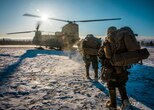 Marines prepare to board a U.S. Army CH-47 Chinook, prior to a raid on a long range radar site, at Fort Greely, Alaska, Feb. 27, 2020, during U.S. Northern Command exercise Arctic Edge 2020. AE20 is the largest joint exercise scheduled in Alaska this year. Approximately 1,000 U.S. military personnel will participate in the multi-service exercise. The exercise is conducted under the authority of North American Aerospace Defense Command and NORTHCOM. (U.S. Marine Corps photo by Lance Cpl. Jose Gonzalez)