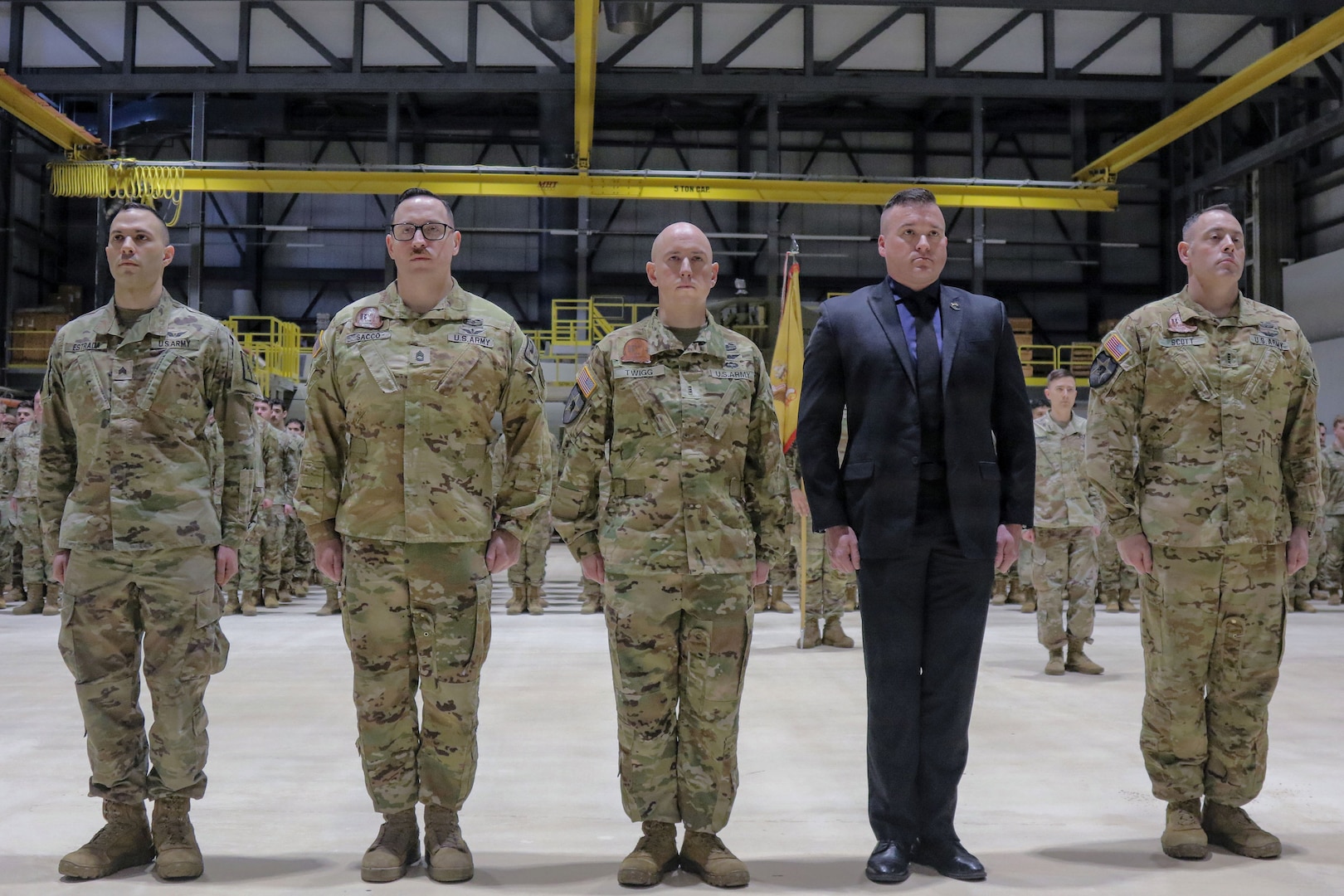 Five of six New York Army National Guard Soldiers who received a French medal in recognition of the aid they offered to French special operations forces in August 2023, stand in formation during an award ceremony in Rochester, New York, Feb. 22, 2026.