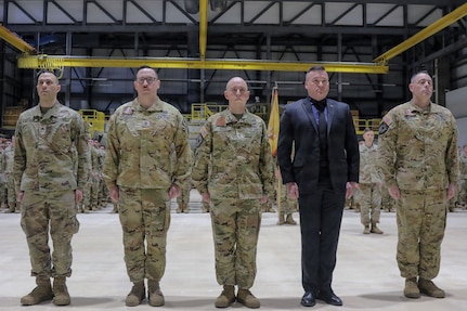 Five of six New York Army National Guard Soldiers who received a French medal in recognition of the aid they offered to French special operations forces in August 2023, stand in formation during an award ceremony in Rochester, New York, Feb. 22, 2026.